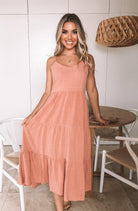 Sonya rust tiered linen midi dress, styled view