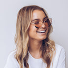 Cadence blush sunglasses, side view