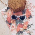Calais clear frame sunglasses, folded view