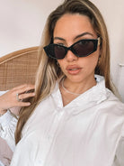Iris black sunglasses, folded view