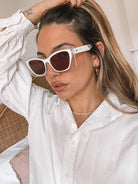 Frankie beige sunglasses, folded view