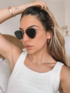 Cora gold-tone sunglasses, folded view