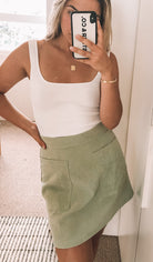 Women's sage green fitted mini skirt, the Amba Skirt in Sage by Esther & Co